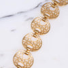 Vintage Trifari Wide Gold Cut Out Link Bracelet by Crown Trifari - Vintage Meet Modern Vintage Jewelry - Chicago, Illinois - #oldhollywoodglamour #vintagemeetmodern #designervintage #jewelrybox #antiquejewelry #vintagejewelry