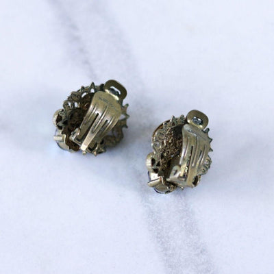 Vintage West Germany Earrings with Dark Aurora Borealis Crystal and Purple Rhinestones by West Germany - Vintage Meet Modern Vintage Jewelry - Chicago, Illinois - #oldhollywoodglamour #vintagemeetmodern #designervintage #jewelrybox #antiquejewelry #vintagejewelry