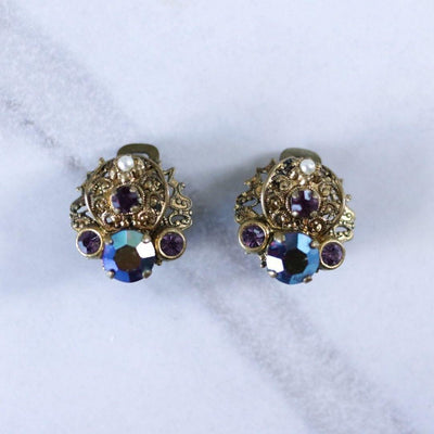 Vintage West Germany Earrings with Dark Aurora Borealis Crystal and Purple Rhinestones by West Germany - Vintage Meet Modern Vintage Jewelry - Chicago, Illinois - #oldhollywoodglamour #vintagemeetmodern #designervintage #jewelrybox #antiquejewelry #vintagejewelry