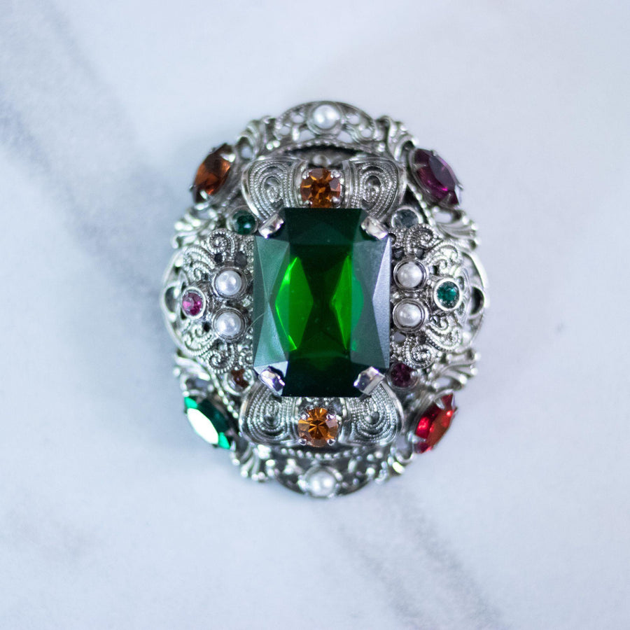 Vintage West Germany Silver Filigree Brooch with Emerald Green Rhinestones, Colorful Crystals, and Faux Pearls by West Germany - Vintage Meet Modern Vintage Jewelry - Chicago, Illinois - #oldhollywoodglamour #vintagemeetmodern #designervintage #jewelrybox #antiquejewelry #vintagejewelry