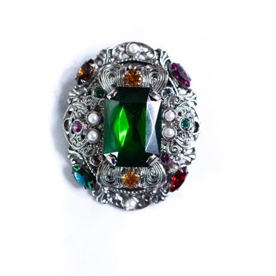 Vintage West Germany Silver Filigree Brooch with Emerald Green Rhinestones, Colorful Crystals, and Faux Pearls by West Germany - Vintage Meet Modern Vintage Jewelry - Chicago, Illinois - #oldhollywoodglamour #vintagemeetmodern #designervintage #jewelrybox #antiquejewelry #vintagejewelry