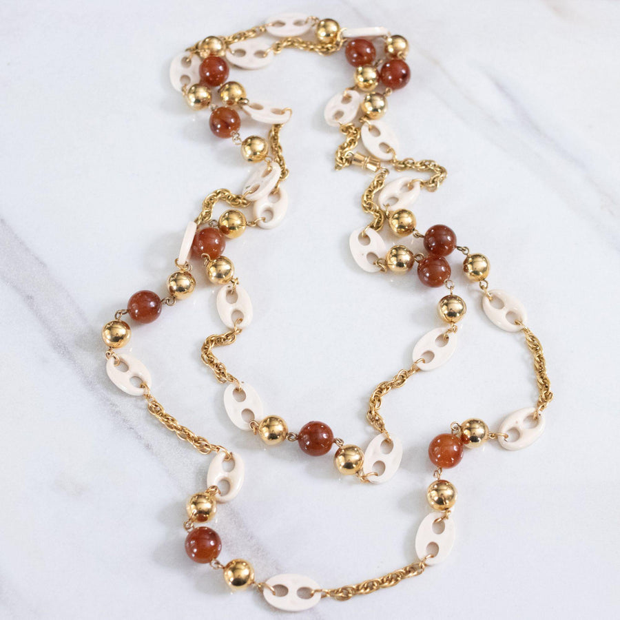 Vintage 1960s Cream Lucite Mariner Link, Gold, and Faux Tortoise Long Necklace by Unsigned Beauty - Vintage Meet Modern Vintage Jewelry - Chicago, Illinois - #oldhollywoodglamour #vintagemeetmodern #designervintage #jewelrybox #antiquejewelry #vintagejewelry
