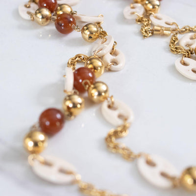 Vintage 1960s Cream Lucite Mariner Link, Gold, and Faux Tortoise Long Necklace by Unsigned Beauty - Vintage Meet Modern Vintage Jewelry - Chicago, Illinois - #oldhollywoodglamour #vintagemeetmodern #designervintage #jewelrybox #antiquejewelry #vintagejewelry