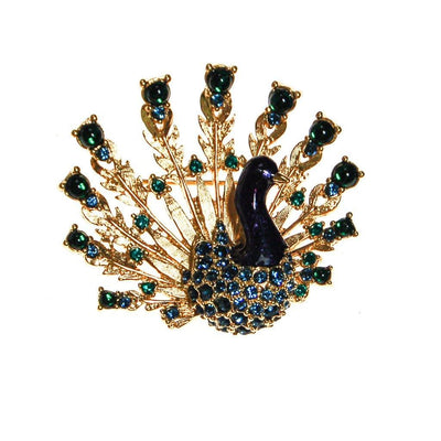 Joan Collins Jeweled Peacock Brooch by Joan Collins - Vintage Meet Modern Vintage Jewelry - Chicago, Illinois - #oldhollywoodglamour #vintagemeetmodern #designervintage #jewelrybox #antiquejewelry #vintagejewelry