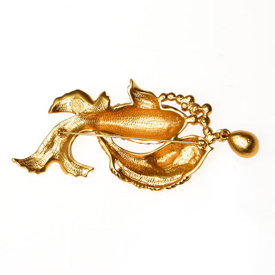Elizabeth Taylor Sea Shimmer Jumpin Koi Fish Brooch by Elizabeth Taylor for Avon - Vintage Meet Modern Vintage Jewelry - Chicago, Illinois - #oldhollywoodglamour #vintagemeetmodern #designervintage #jewelrybox #antiquejewelry #vintagejewelry