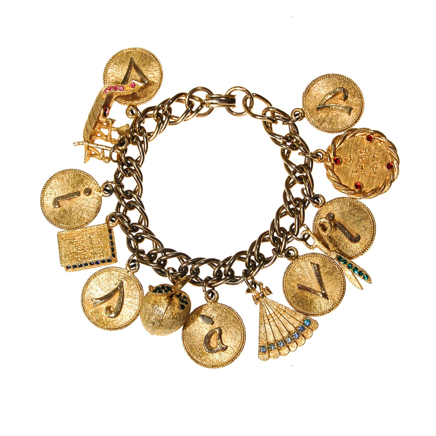 Mid Century Modern Loaded Retro Charm Bracelet by Unsigned Beauty - Vintage Meet Modern Vintage Jewelry - Chicago, Illinois - #oldhollywoodglamour #vintagemeetmodern #designervintage #jewelrybox #antiquejewelry #vintagejewelry