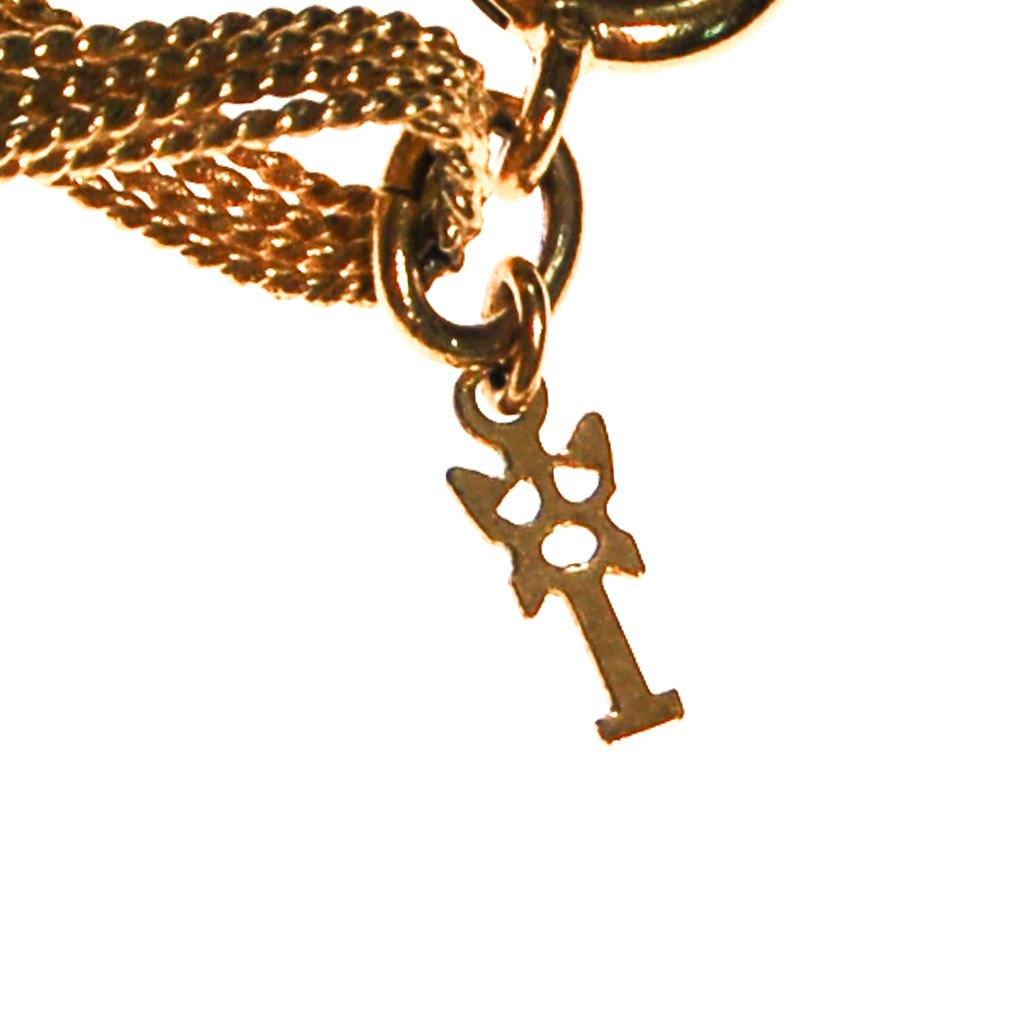 Crown Trifari Figure 8 Twisted Link Gold Necklace by Crown Trifari - Vintage Meet Modern Vintage Jewelry - Chicago, Illinois - #oldhollywoodglamour #vintagemeetmodern #designervintage #jewelrybox #antiquejewelry #vintagejewelry
