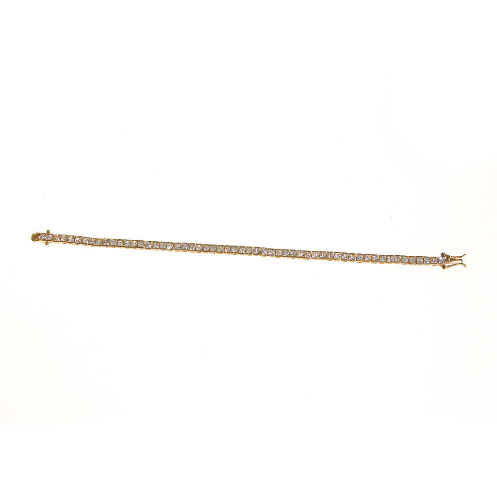 Princess Cut CZ Tennis Bracelet, Gold Tone Setting, 1980s by Sterling Silver - Vintage Meet Modern Vintage Jewelry - Chicago, Illinois - #oldhollywoodglamour #vintagemeetmodern #designervintage #jewelrybox #antiquejewelry #vintagejewelry
