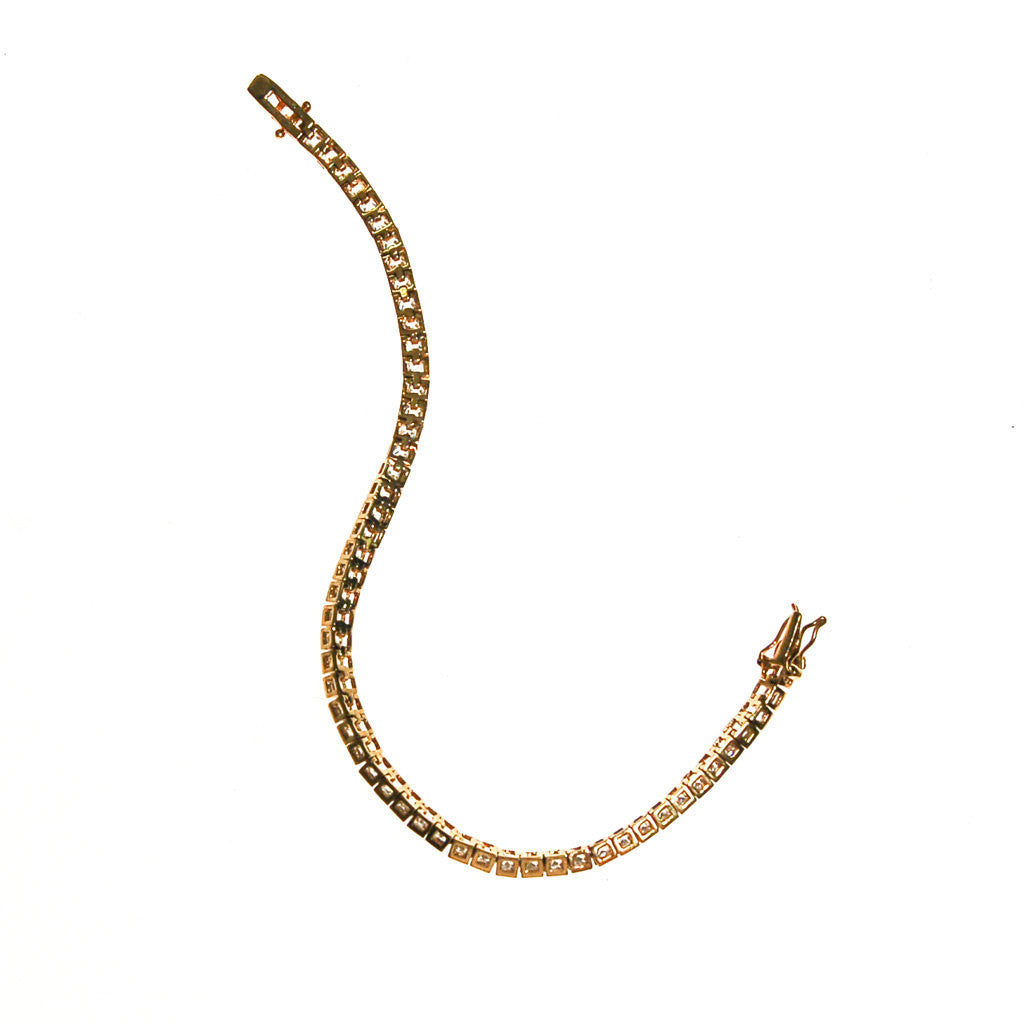 Princess Cut CZ Tennis Bracelet, Gold Tone Setting, 1980s by Sterling Silver - Vintage Meet Modern Vintage Jewelry - Chicago, Illinois - #oldhollywoodglamour #vintagemeetmodern #designervintage #jewelrybox #antiquejewelry #vintagejewelry