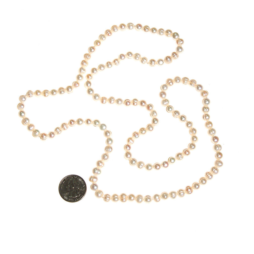 Infinity Strand White Cultured Freshwater Pearl Necklace by Freshwater Pearls - Vintage Meet Modern Vintage Jewelry - Chicago, Illinois - #oldhollywoodglamour #vintagemeetmodern #designervintage #jewelrybox #antiquejewelry #vintagejewelry