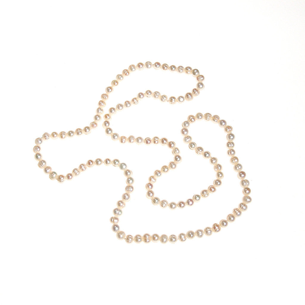 Infinity Strand White Cultured Freshwater Pearl Necklace by Freshwater Pearls - Vintage Meet Modern Vintage Jewelry - Chicago, Illinois - #oldhollywoodglamour #vintagemeetmodern #designervintage #jewelrybox #antiquejewelry #vintagejewelry