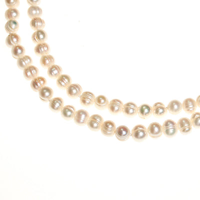 Infinity Strand White Cultured Freshwater Pearl Necklace by Freshwater Pearls - Vintage Meet Modern Vintage Jewelry - Chicago, Illinois - #oldhollywoodglamour #vintagemeetmodern #designervintage #jewelrybox #antiquejewelry #vintagejewelry