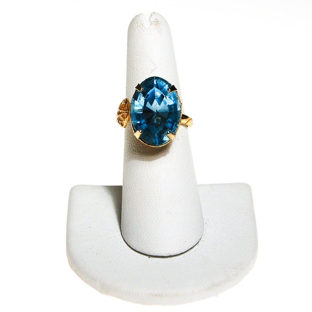 Light Blue Crystal Ring, Oval, Shape, Statement Ring, Gold Tone, Adjustable, Designer Jewelry 1960s by Unsigned Beauty - Vintage Meet Modern Vintage Jewelry - Chicago, Illinois - #oldhollywoodglamour #vintagemeetmodern #designervintage #jewelrybox #antiquejewelry #vintagejewelry