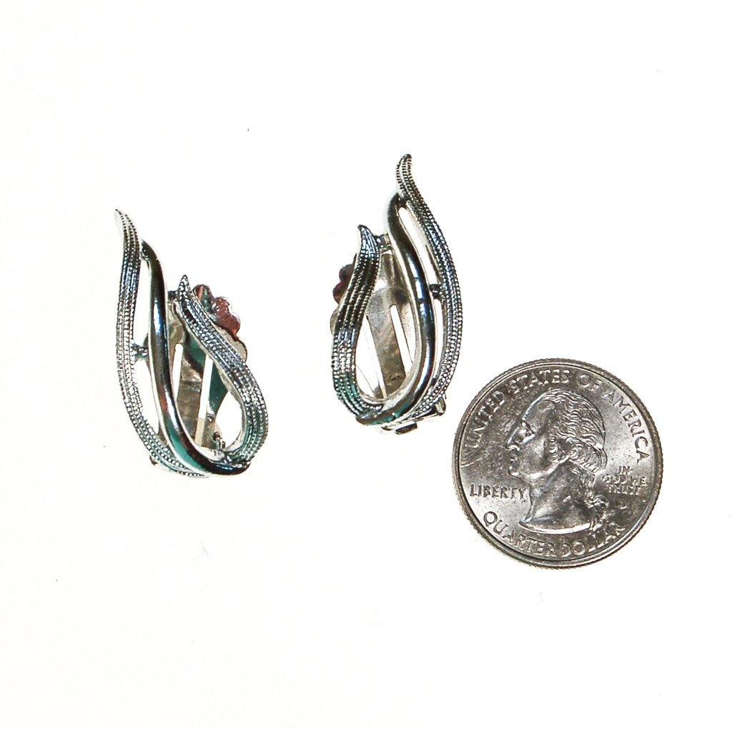 Sarah Coventry Silver Flame Earrings by Sarah Coventry - Vintage Meet Modern Vintage Jewelry - Chicago, Illinois - #oldhollywoodglamour #vintagemeetmodern #designervintage #jewelrybox #antiquejewelry #vintagejewelry