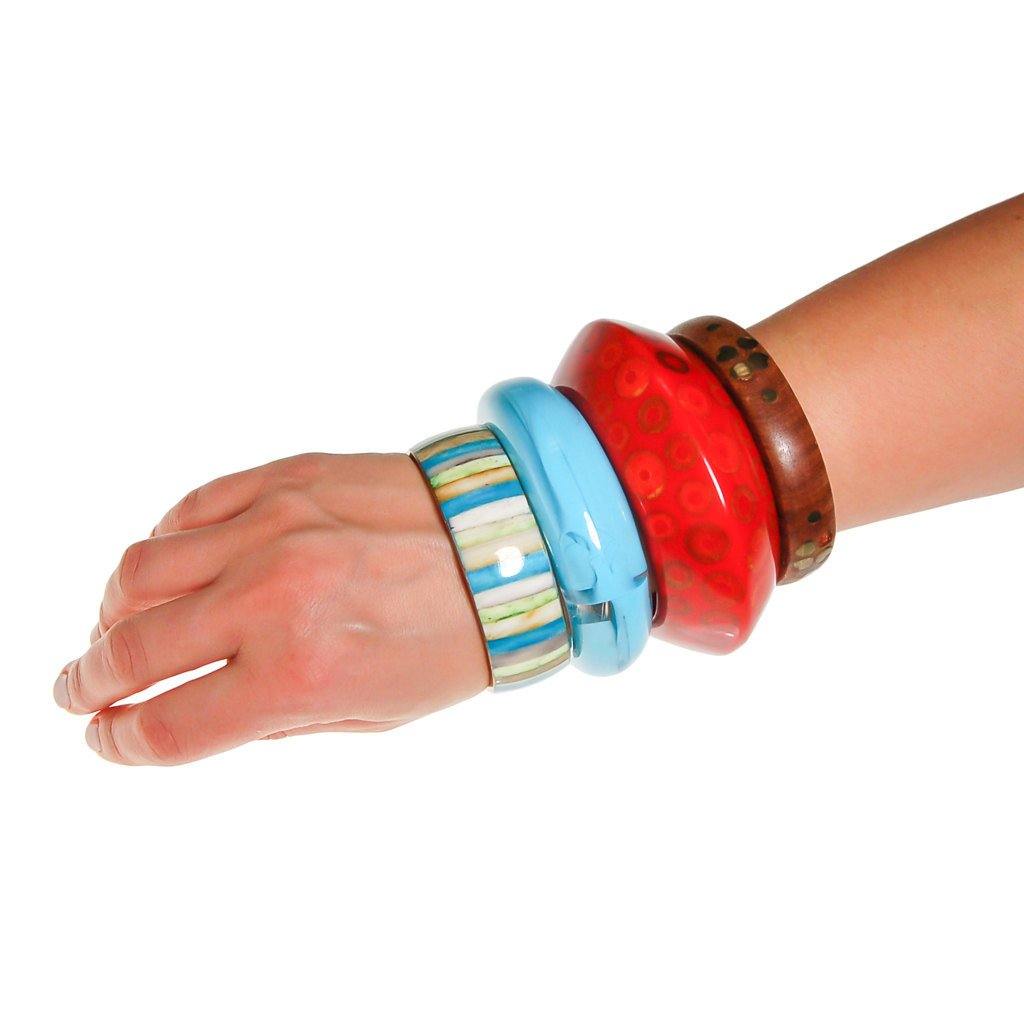 Blue and Clear Swirled Lucite Bangle Bracelet by 1960s - Vintage Meet Modern Vintage Jewelry - Chicago, Illinois - #oldhollywoodglamour #vintagemeetmodern #designervintage #jewelrybox #antiquejewelry #vintagejewelry