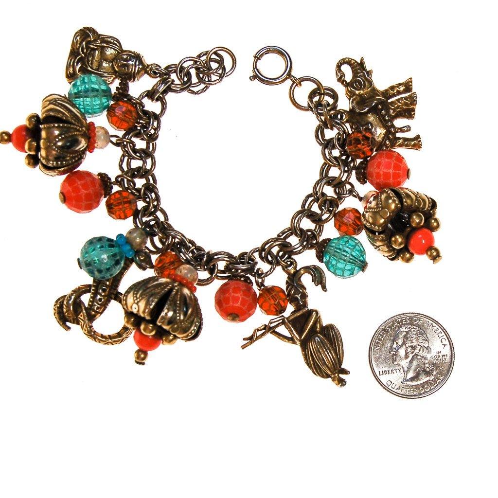 Loaded Charm Bracelet, Snake Charmer, Cobra, Elephant, Moroccan Influence, 1940s Made in Germany by Made in Germany - Vintage Meet Modern Vintage Jewelry - Chicago, Illinois - #oldhollywoodglamour #vintagemeetmodern #designervintage #jewelrybox #antiquejewelry #vintagejewelry