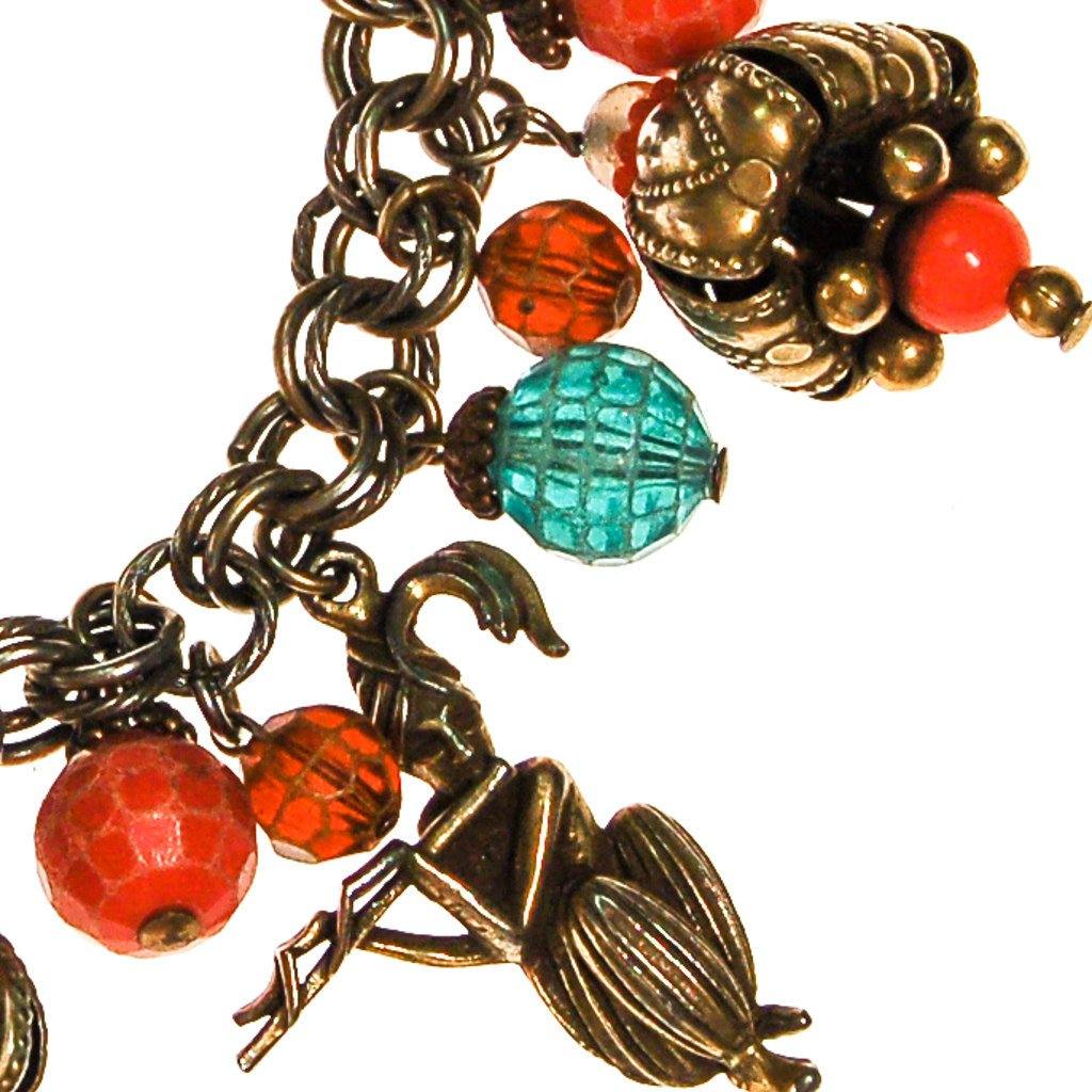Loaded Charm Bracelet, Snake Charmer, Cobra, Elephant, Moroccan Influence, 1940s Made in Germany by Made in Germany - Vintage Meet Modern Vintage Jewelry - Chicago, Illinois - #oldhollywoodglamour #vintagemeetmodern #designervintage #jewelrybox #antiquejewelry #vintagejewelry