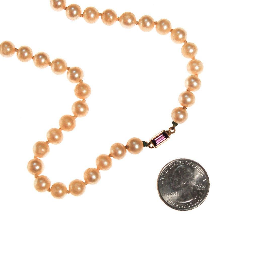 Strand of Pearls with Amethyst Crystal Clasp by Anne Klein by Anne Klein - Vintage Meet Modern Vintage Jewelry - Chicago, Illinois - #oldhollywoodglamour #vintagemeetmodern #designervintage #jewelrybox #antiquejewelry #vintagejewelry