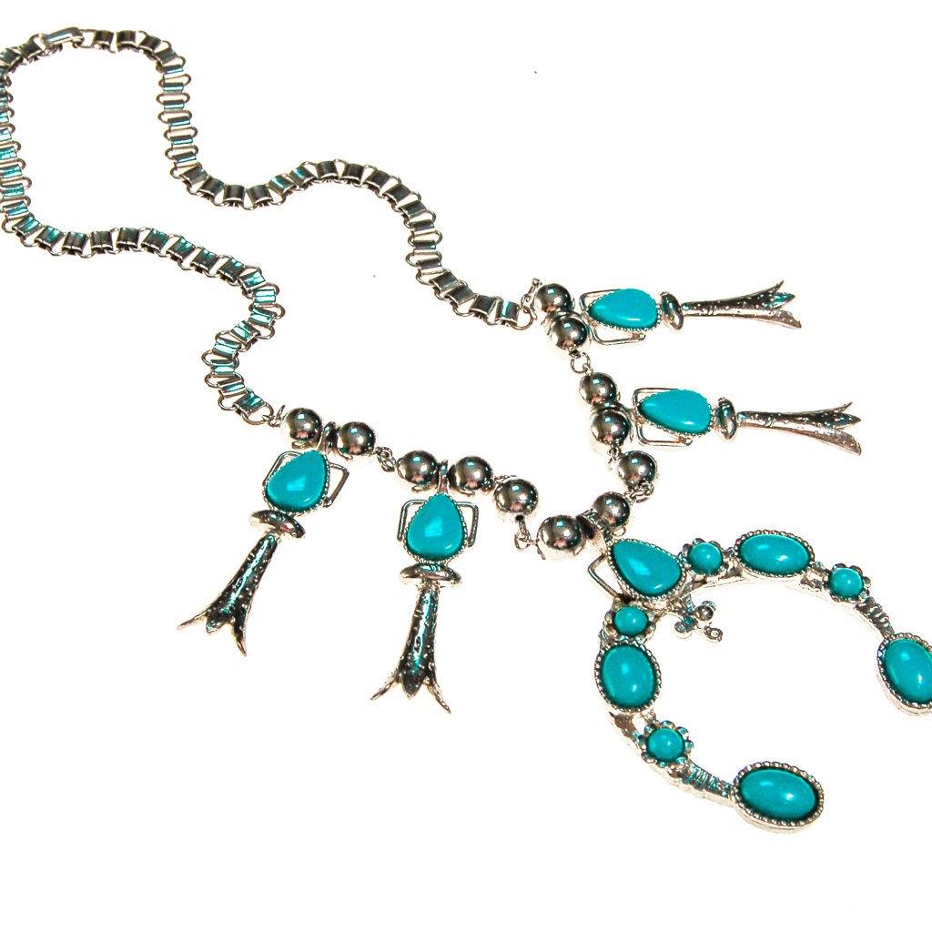 Silver tone necklace with pendant and turquoise