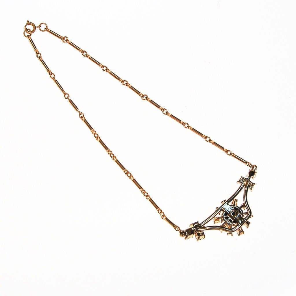 Vintage Rhinestone Pendant Necklace in Gold Tone by 1950s - Vintage Meet Modern Vintage Jewelry - Chicago, Illinois - #oldhollywoodglamour #vintagemeetmodern #designervintage #jewelrybox #antiquejewelry #vintagejewelry