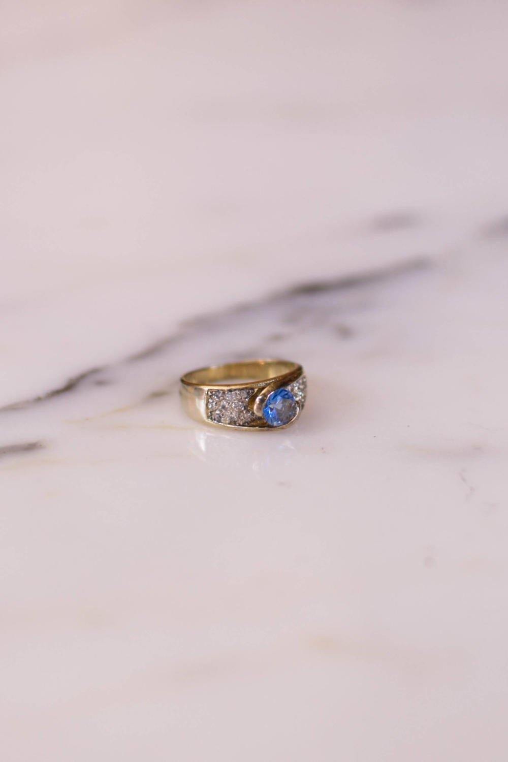 Blue Topaz and Pave CZ Ring set in Sterling Silver