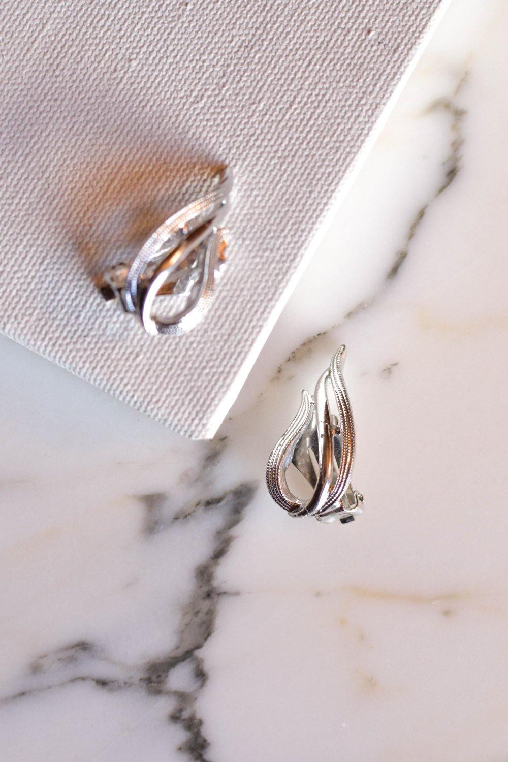 Sarah Coventry Silver Flame Earrings by Sarah Coventry - Vintage Meet Modern Vintage Jewelry - Chicago, Illinois - #oldhollywoodglamour #vintagemeetmodern #designervintage #jewelrybox #antiquejewelry #vintagejewelry