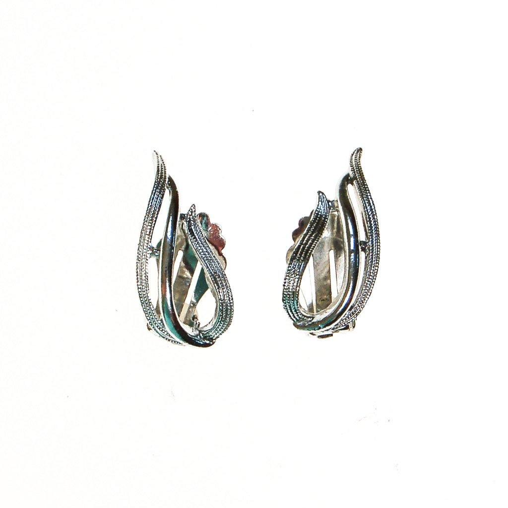 Sarah Coventry Silver Flame Earrings by Sarah Coventry - Vintage Meet Modern Vintage Jewelry - Chicago, Illinois - #oldhollywoodglamour #vintagemeetmodern #designervintage #jewelrybox #antiquejewelry #vintagejewelry