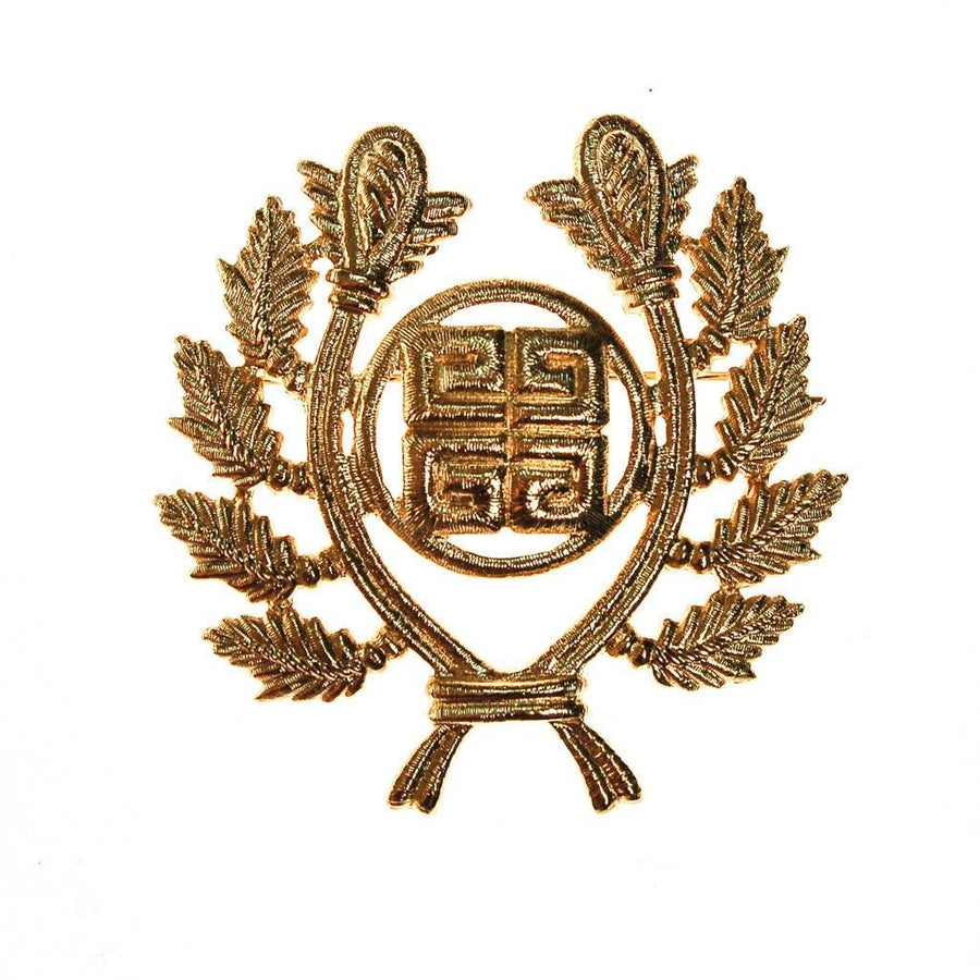 Givenchy Gold Logo Brooch by Givenchy - Vintage Meet Modern Vintage Jewelry - Chicago, Illinois - #oldhollywoodglamour #vintagemeetmodern #designervintage #jewelrybox #antiquejewelry #vintagejewelry