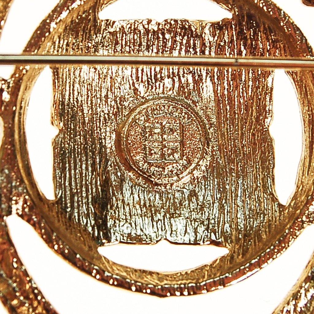 Givenchy Gold Logo Brooch by Givenchy - Vintage Meet Modern Vintage Jewelry - Chicago, Illinois - #oldhollywoodglamour #vintagemeetmodern #designervintage #jewelrybox #antiquejewelry #vintagejewelry