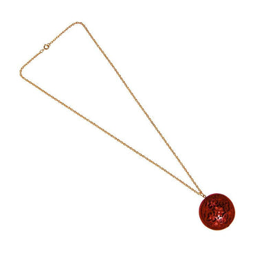 Carved Cinnabar Medallion Pendant Necklace by Chinese Export - Vintage Meet Modern Vintage Jewelry - Chicago, Illinois - #oldhollywoodglamour #vintagemeetmodern #designervintage #jewelrybox #antiquejewelry #vintagejewelry