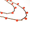 Long Gold Necklace with Coral Orange Beads that Dangle by unsigned - Vintage Meet Modern Vintage Jewelry - Chicago, Illinois - #oldhollywoodglamour #vintagemeetmodern #designervintage #jewelrybox #antiquejewelry #vintagejewelry