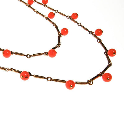 Long Gold Necklace with Coral Orange Beads that Dangle by unsigned - Vintage Meet Modern Vintage Jewelry - Chicago, Illinois - #oldhollywoodglamour #vintagemeetmodern #designervintage #jewelrybox #antiquejewelry #vintagejewelry