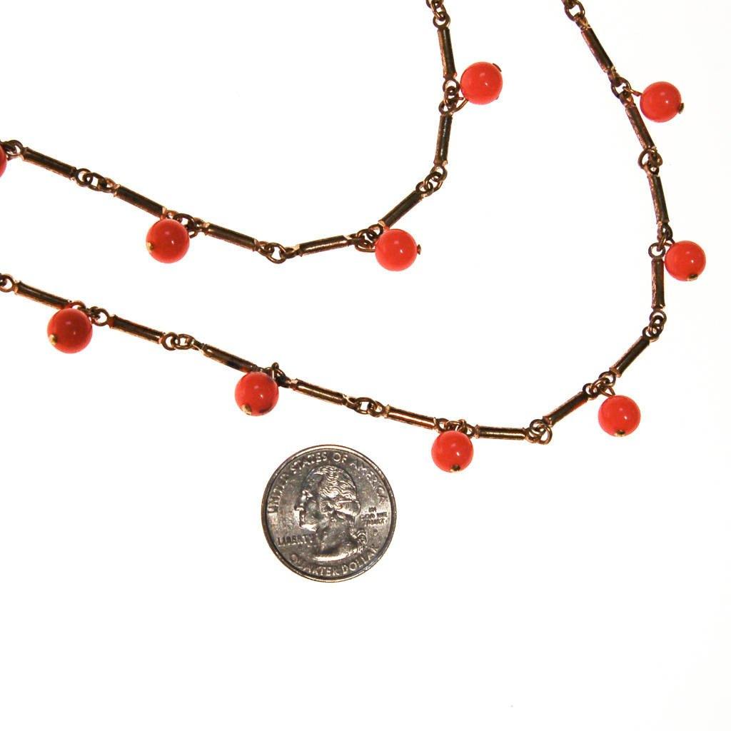 Long Gold Necklace with Coral Orange Beads that Dangle by unsigned - Vintage Meet Modern Vintage Jewelry - Chicago, Illinois - #oldhollywoodglamour #vintagemeetmodern #designervintage #jewelrybox #antiquejewelry #vintagejewelry