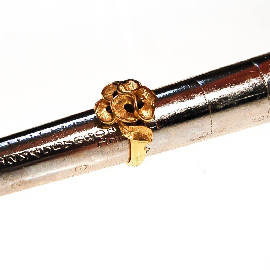 Crown Trifari Ring with Gold Knot by Crown Trifari - Vintage Meet Modern Vintage Jewelry - Chicago, Illinois - #oldhollywoodglamour #vintagemeetmodern #designervintage #jewelrybox #antiquejewelry #vintagejewelry