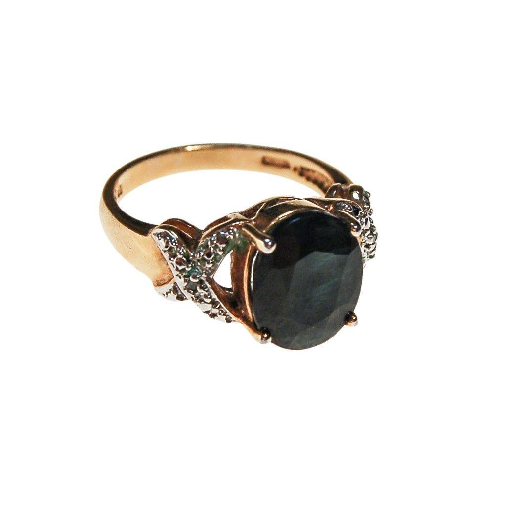 Oval Sapphire Solitaire Ring with Milgrain Band Detail