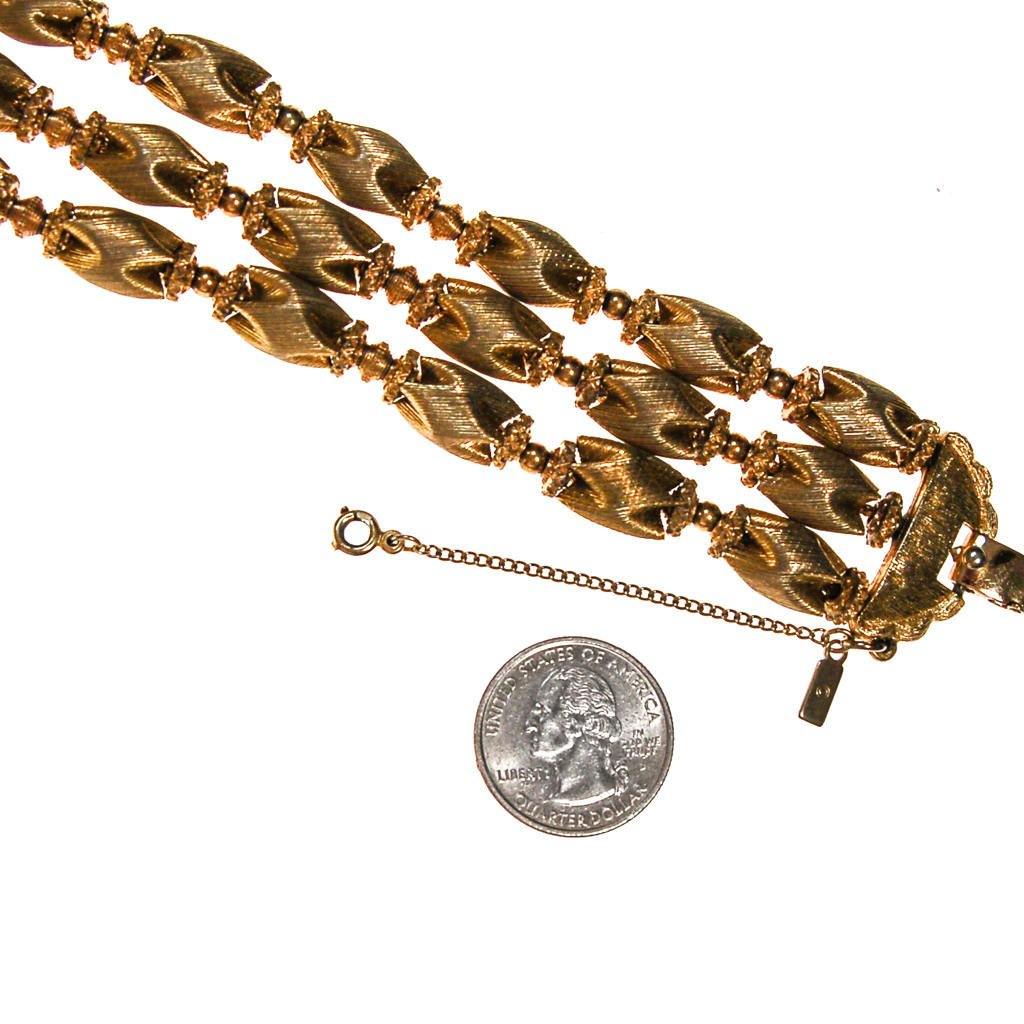 Monet Triple Strand Gold Link Bracelet by Monet - Vintage Meet Modern Vintage Jewelry - Chicago, Illinois - #oldhollywoodglamour #vintagemeetmodern #designervintage #jewelrybox #antiquejewelry #vintagejewelry