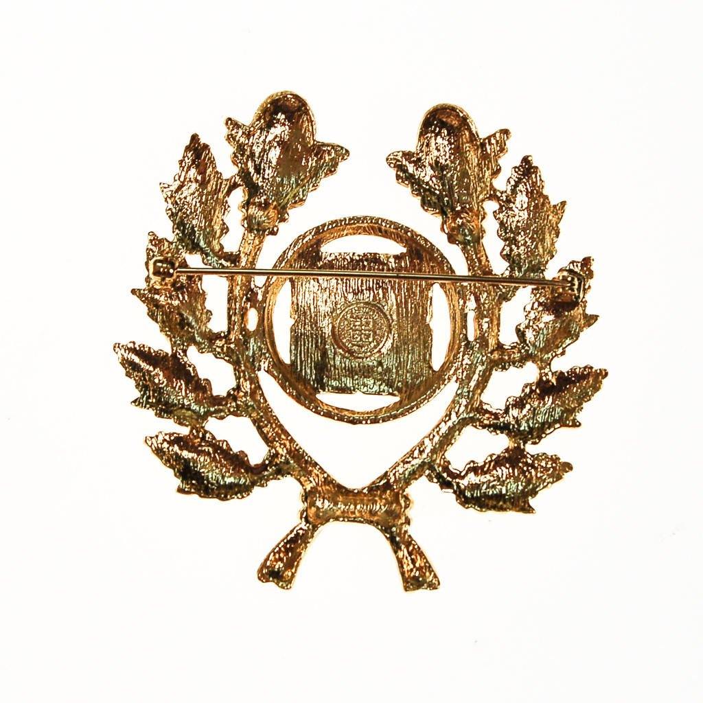 Givenchy Gold Logo Brooch by Givenchy - Vintage Meet Modern Vintage Jewelry - Chicago, Illinois - #oldhollywoodglamour #vintagemeetmodern #designervintage #jewelrybox #antiquejewelry #vintagejewelry