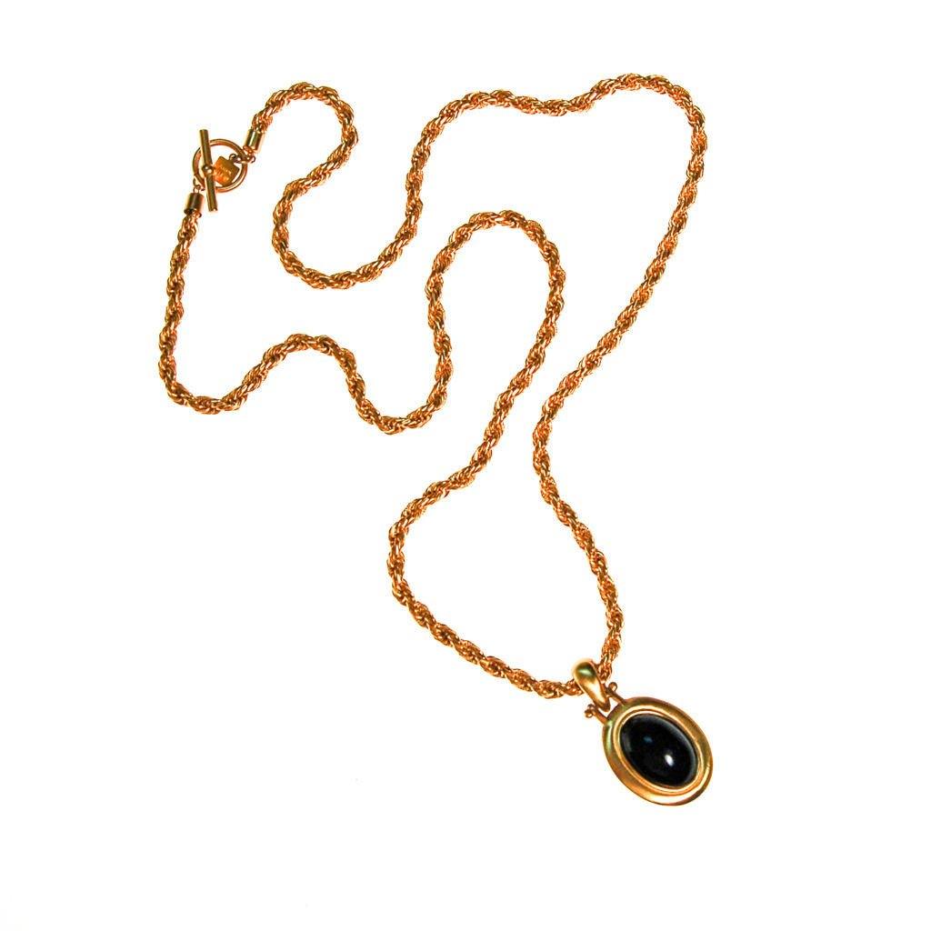 Vintage Anne Klein Couture Black Onyx Cabochon Pendant Necklace by Anne Klein - Vintage Meet Modern Vintage Jewelry - Chicago, Illinois - #oldhollywoodglamour #vintagemeetmodern #designervintage #jewelrybox #antiquejewelry #vintagejewelry