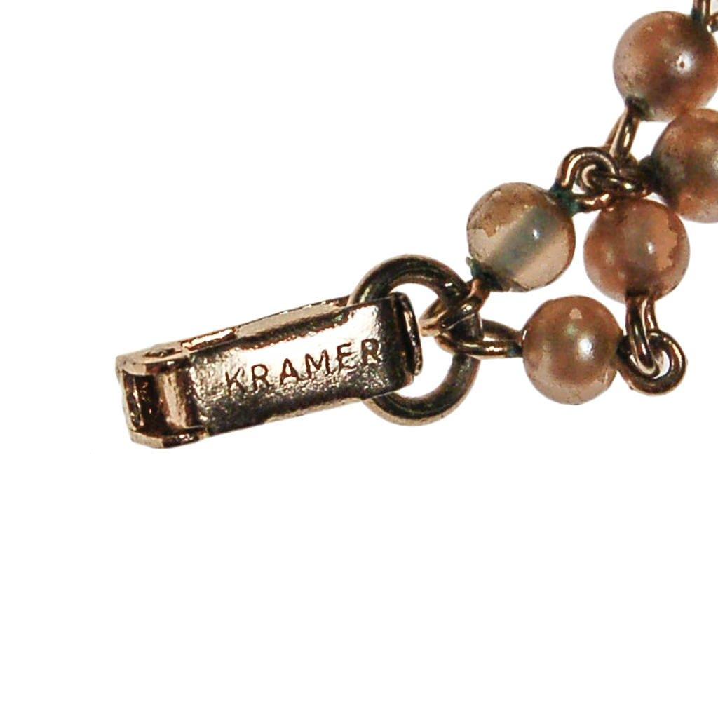 Kramer Faux Pearl, Rhinestone, Blue Lucite Charm Bracelet by Kramer - Vintage Meet Modern Vintage Jewelry - Chicago, Illinois - #oldhollywoodglamour #vintagemeetmodern #designervintage #jewelrybox #antiquejewelry #vintagejewelry