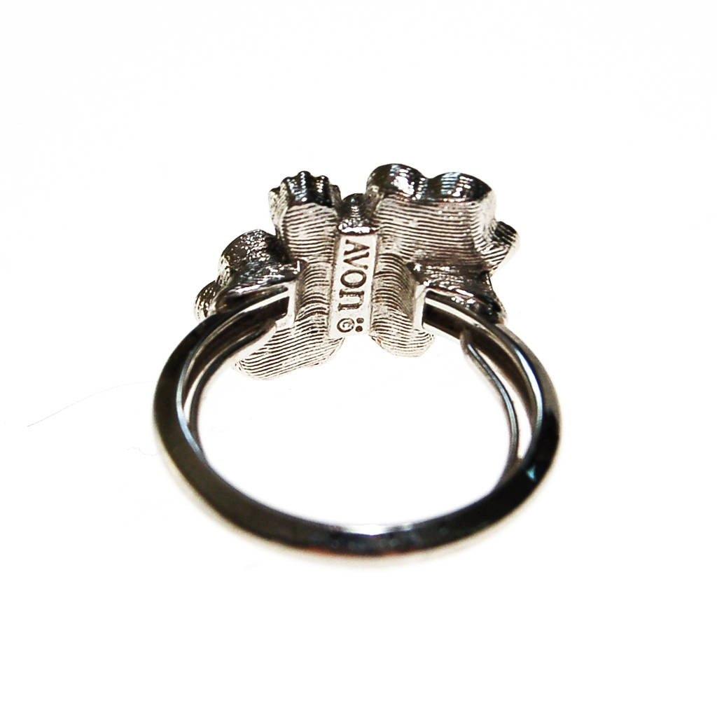 Avon Silver Flower Adjustable Ring with Pink Rhinestones and Faux Pearls, Silver Tone by unsigned - Vintage Meet Modern Vintage Jewelry - Chicago, Illinois - #oldhollywoodglamour #vintagemeetmodern #designervintage #jewelrybox #antiquejewelry #vintagejewelry