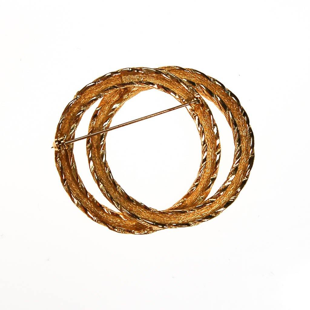 Christian Dior Gold Cable Interlocking Circle Brooch by Christian Dior - Vintage Meet Modern Vintage Jewelry - Chicago, Illinois - #oldhollywoodglamour #vintagemeetmodern #designervintage #jewelrybox #antiquejewelry #vintagejewelry