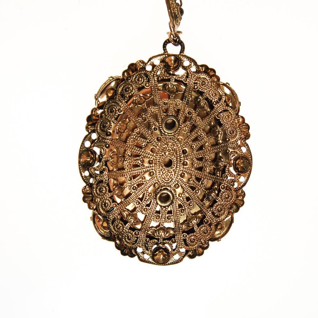 West Germany Black and White Cameo Pendant Necklace by unsigned - Vintage Meet Modern Vintage Jewelry - Chicago, Illinois - #oldhollywoodglamour #vintagemeetmodern #designervintage #jewelrybox #antiquejewelry #vintagejewelry
