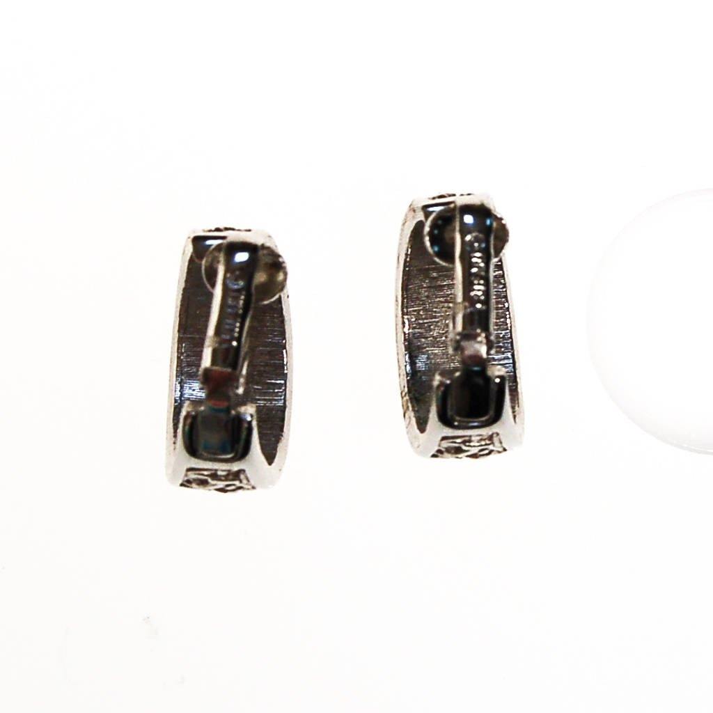 Crown Trifari Silver Hoop Earrings by Crown Trifari - Vintage Meet Modern Vintage Jewelry - Chicago, Illinois - #oldhollywoodglamour #vintagemeetmodern #designervintage #jewelrybox #antiquejewelry #vintagejewelry