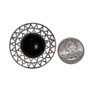 Sarah Coventry Silver Brooch with Black Lucite Center, Round Shape by Sarah Coventry - Vintage Meet Modern Vintage Jewelry - Chicago, Illinois - #oldhollywoodglamour #vintagemeetmodern #designervintage #jewelrybox #antiquejewelry #vintagejewelry