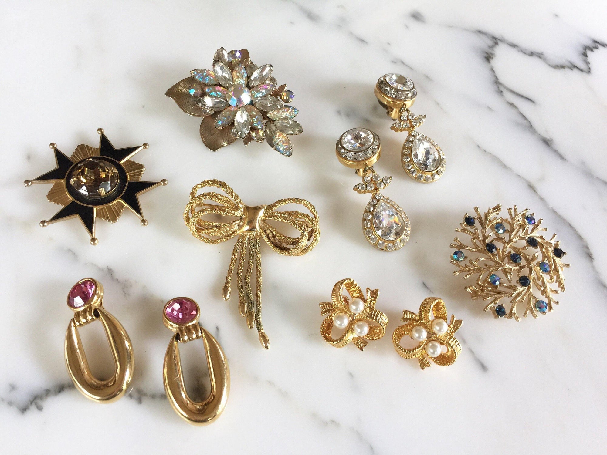 Sparkling Jude Lee Aurora Borealis Rhinestone Flower Brooch by Jude Lee Aurora Borealis - Vintage Meet Modern Vintage Jewelry - Chicago, Illinois - #oldhollywoodglamour #vintagemeetmodern #designervintage #jewelrybox #antiquejewelry #vintagejewelry