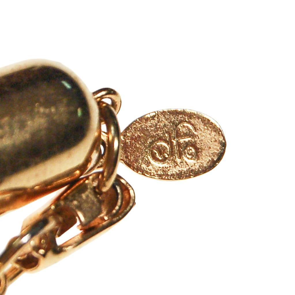 Diane von Furstenberg Cream and Black Pendant Necklace, Statement Necklace, Long Black Cord by Diane Von Furstenberg - Vintage Meet Modern Vintage Jewelry - Chicago, Illinois - #oldhollywoodglamour #vintagemeetmodern #designervintage #jewelrybox #antiquejewelry #vintagejewelry