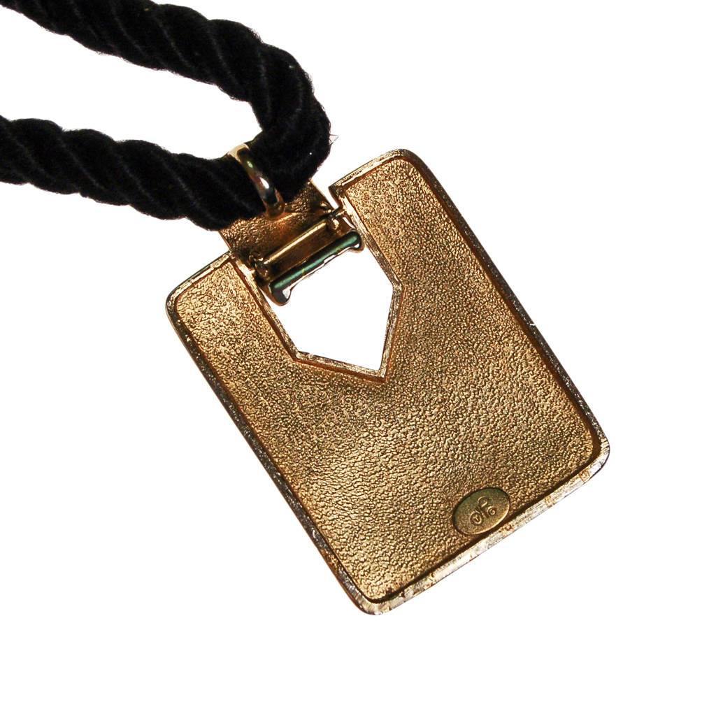 Diane von Furstenberg Cream and Black Pendant Necklace, Statement Necklace, Long Black Cord by Diane Von Furstenberg - Vintage Meet Modern Vintage Jewelry - Chicago, Illinois - #oldhollywoodglamour #vintagemeetmodern #designervintage #jewelrybox #antiquejewelry #vintagejewelry