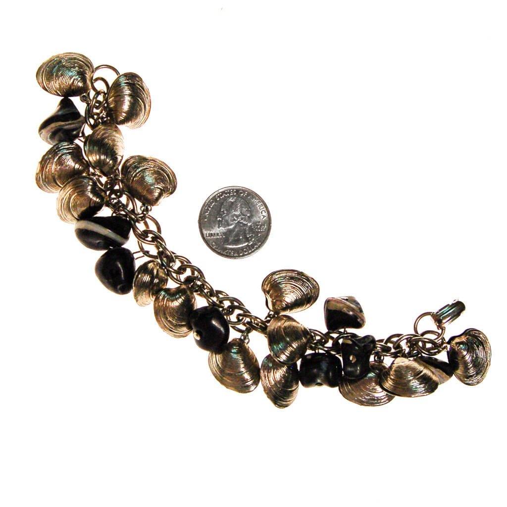 Silver Shell and Black Bead Loaded Charm Bracelet by 1960s - Vintage Meet Modern Vintage Jewelry - Chicago, Illinois - #oldhollywoodglamour #vintagemeetmodern #designervintage #jewelrybox #antiquejewelry #vintagejewelry