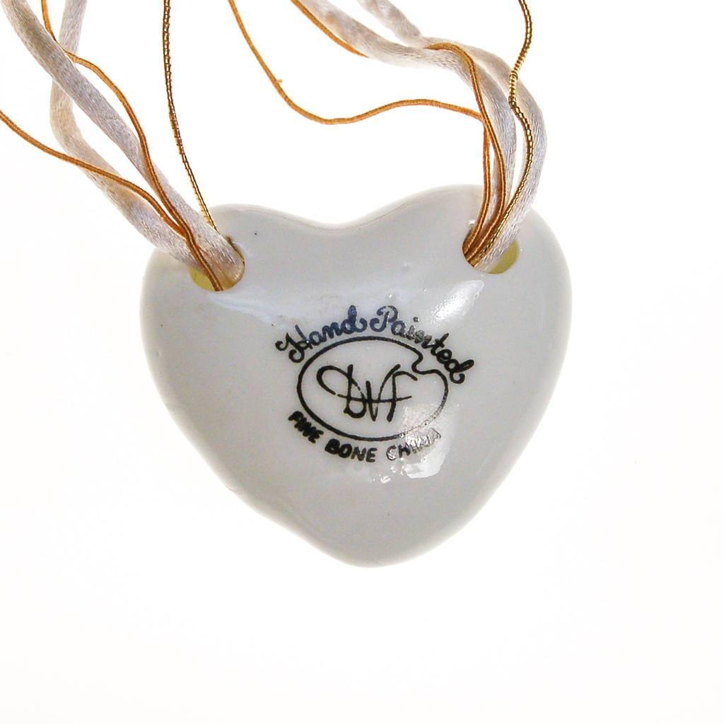 Diane Von Furstenberg Hand Painted Heart Pendant Statement Necklace by Diane von Furstenberg - Vintage Meet Modern Vintage Jewelry - Chicago, Illinois - #oldhollywoodglamour #vintagemeetmodern #designervintage #jewelrybox #antiquejewelry #vintagejewelry