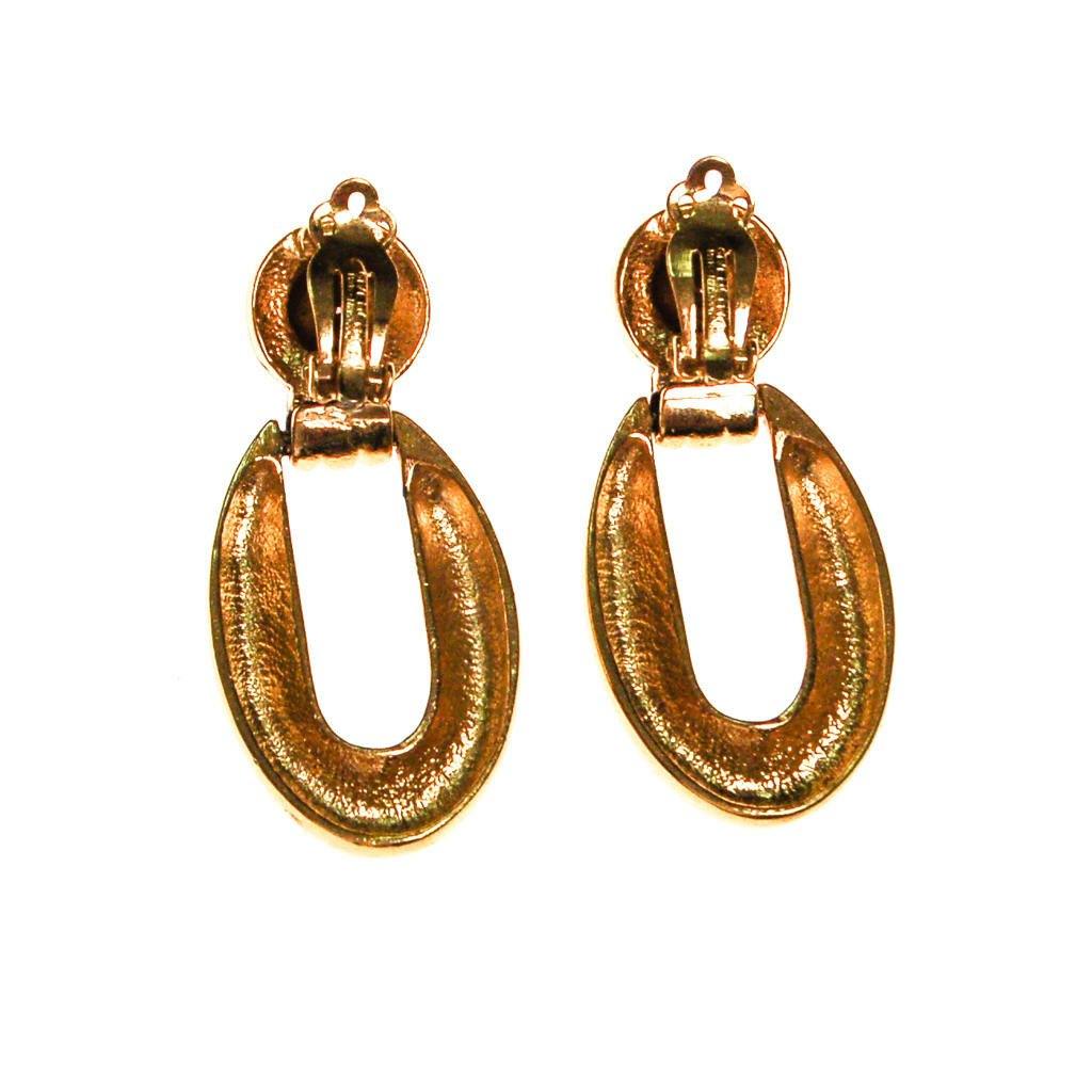 Vintage Givenchy Couture Signed Designer Gold Tone Door Knocker Earrings with Pink Rhinestone by Givenchy - Vintage Meet Modern Vintage Jewelry - Chicago, Illinois - #oldhollywoodglamour #vintagemeetmodern #designervintage #jewelrybox #antiquejewelry #vintagejewelry
